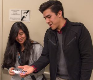 Showing micro drones to students